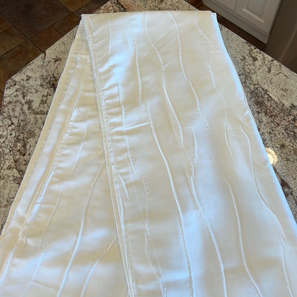 Window Scarf Valance-approx 104”x216”. 100% Textured Polyester.  Eggshell color.